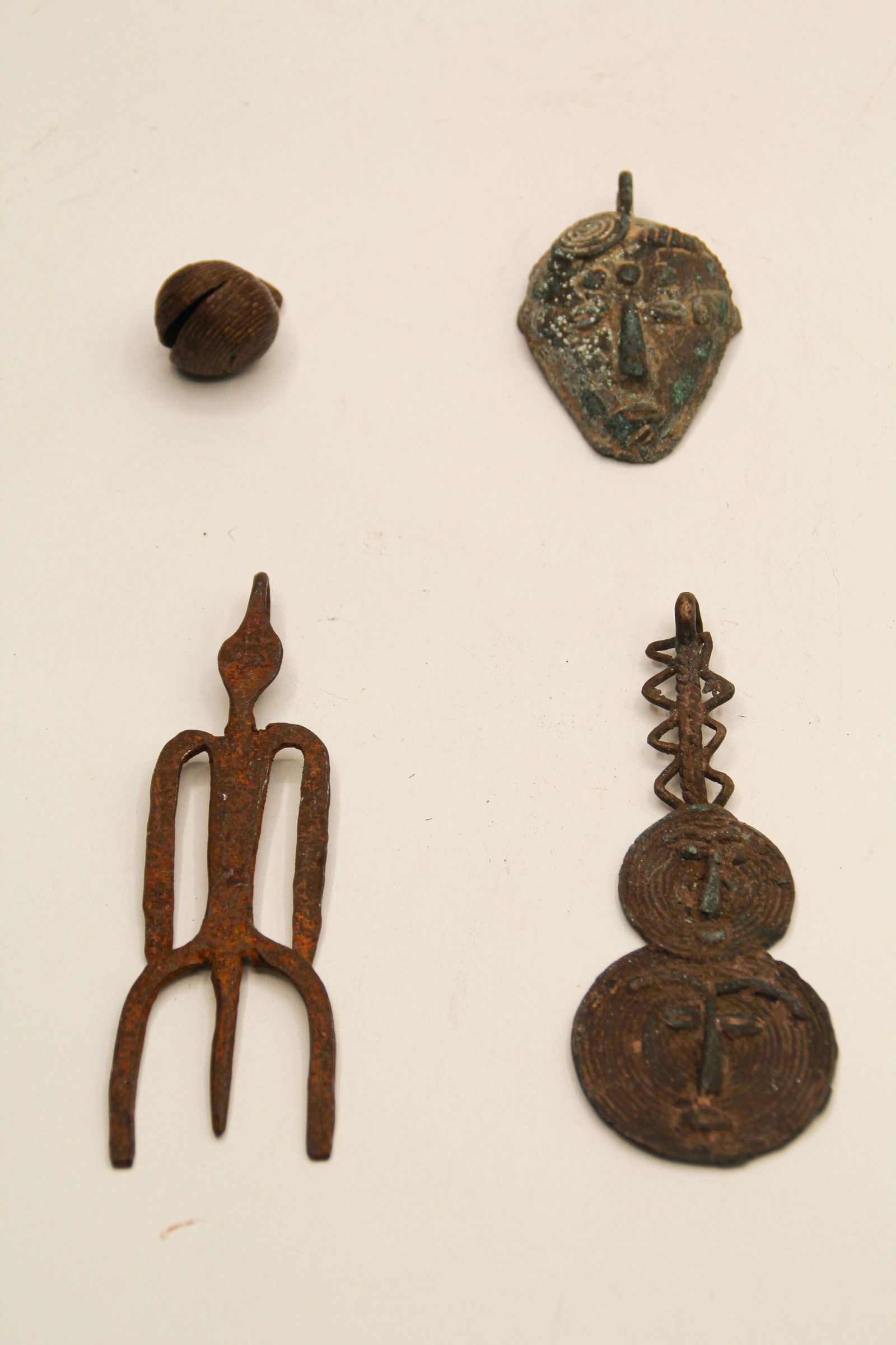African Pendants & Bell (1 of 6)