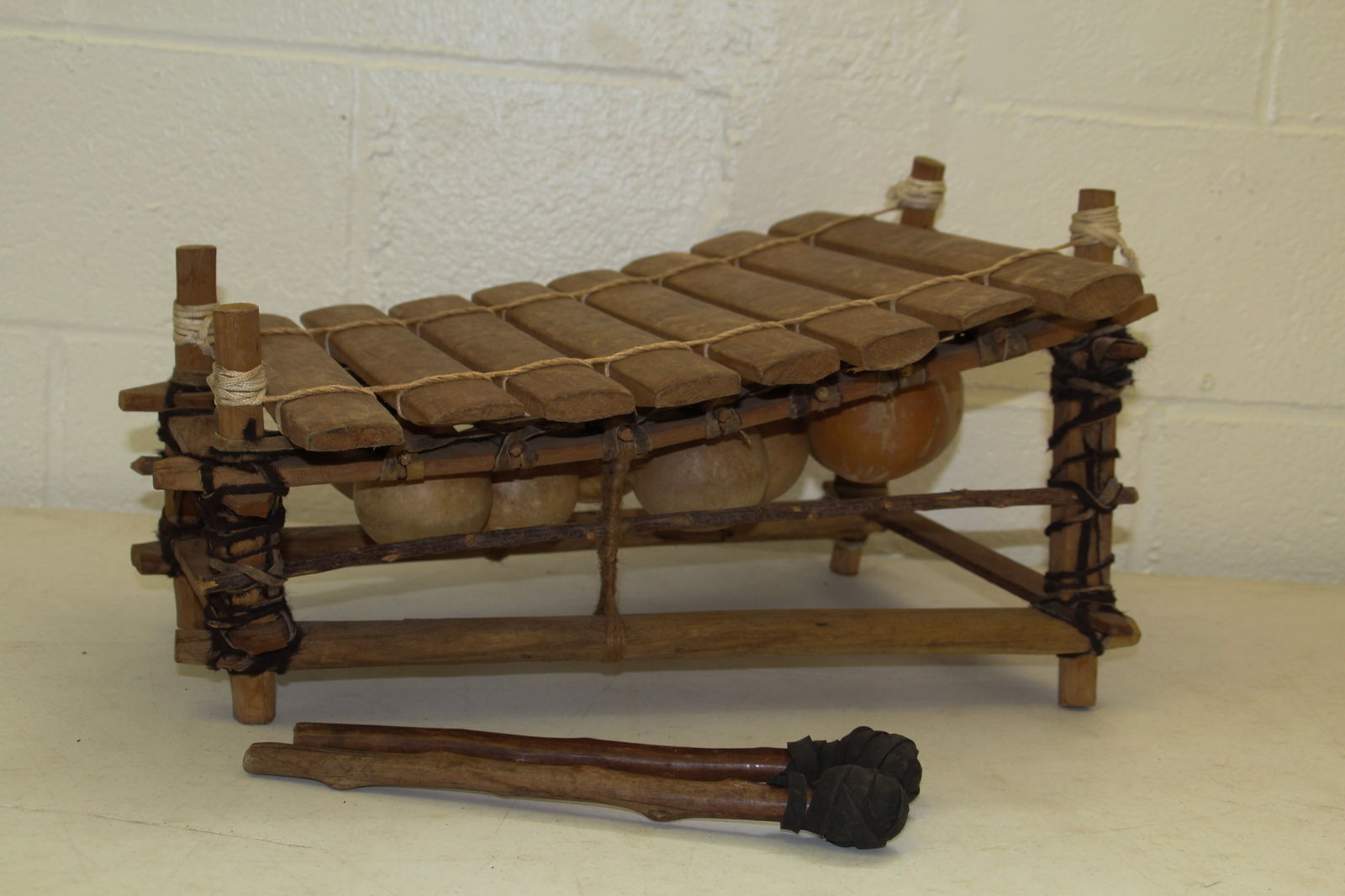 African Wooden & Gourd Xylophone: Approx 14" x 21" x 11" tall. Shipping available thru UPS Store 5528. Email store5528@theupsstore.com to get a quote BEFORE bidding ! There are no refunds because of shipping prices