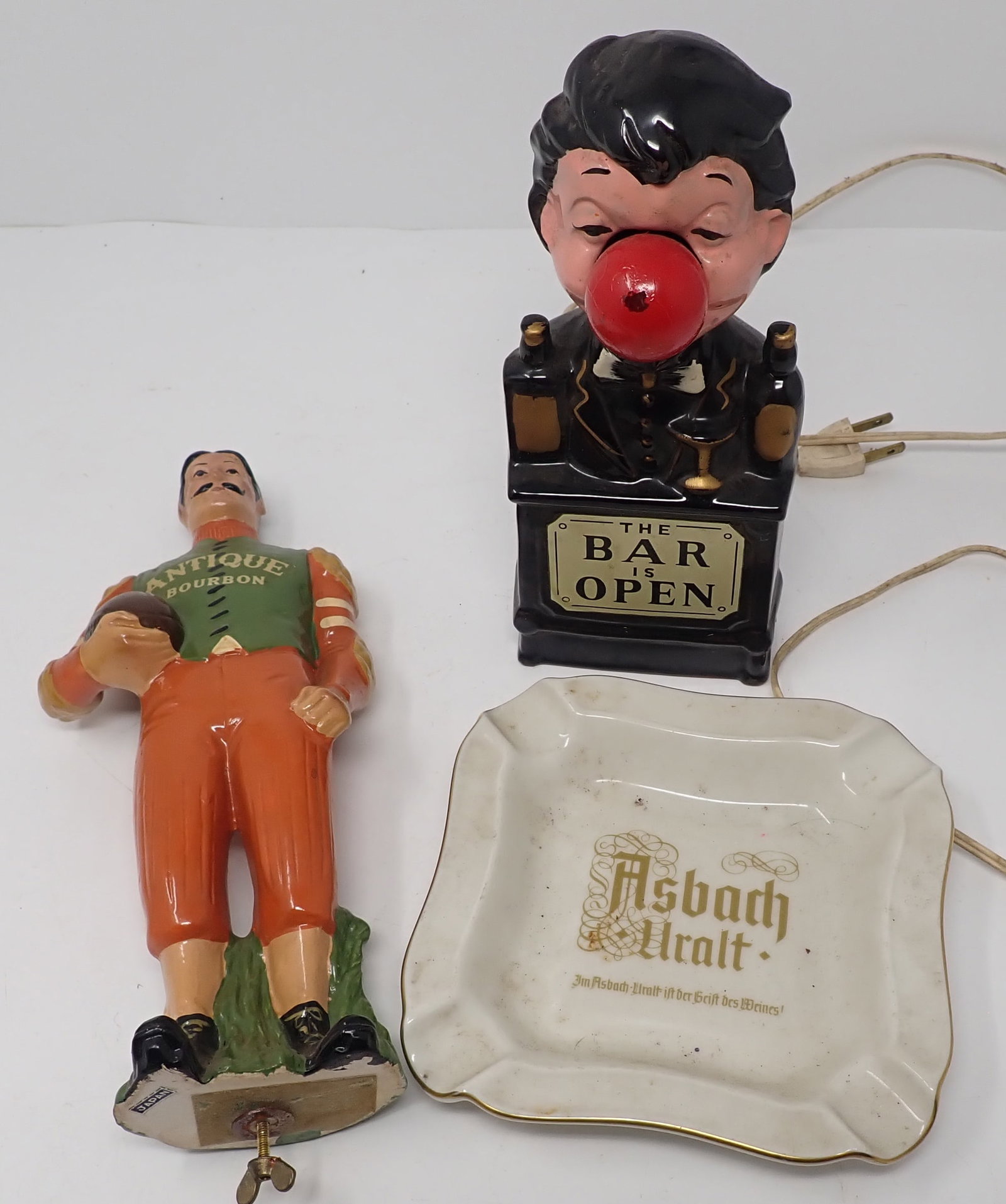 Bar Lamp , Antique Bourbon Football Player & Ashtray: Football player is apprx 9 1/2" tall and was attached to a base and the base broke. Shipping available