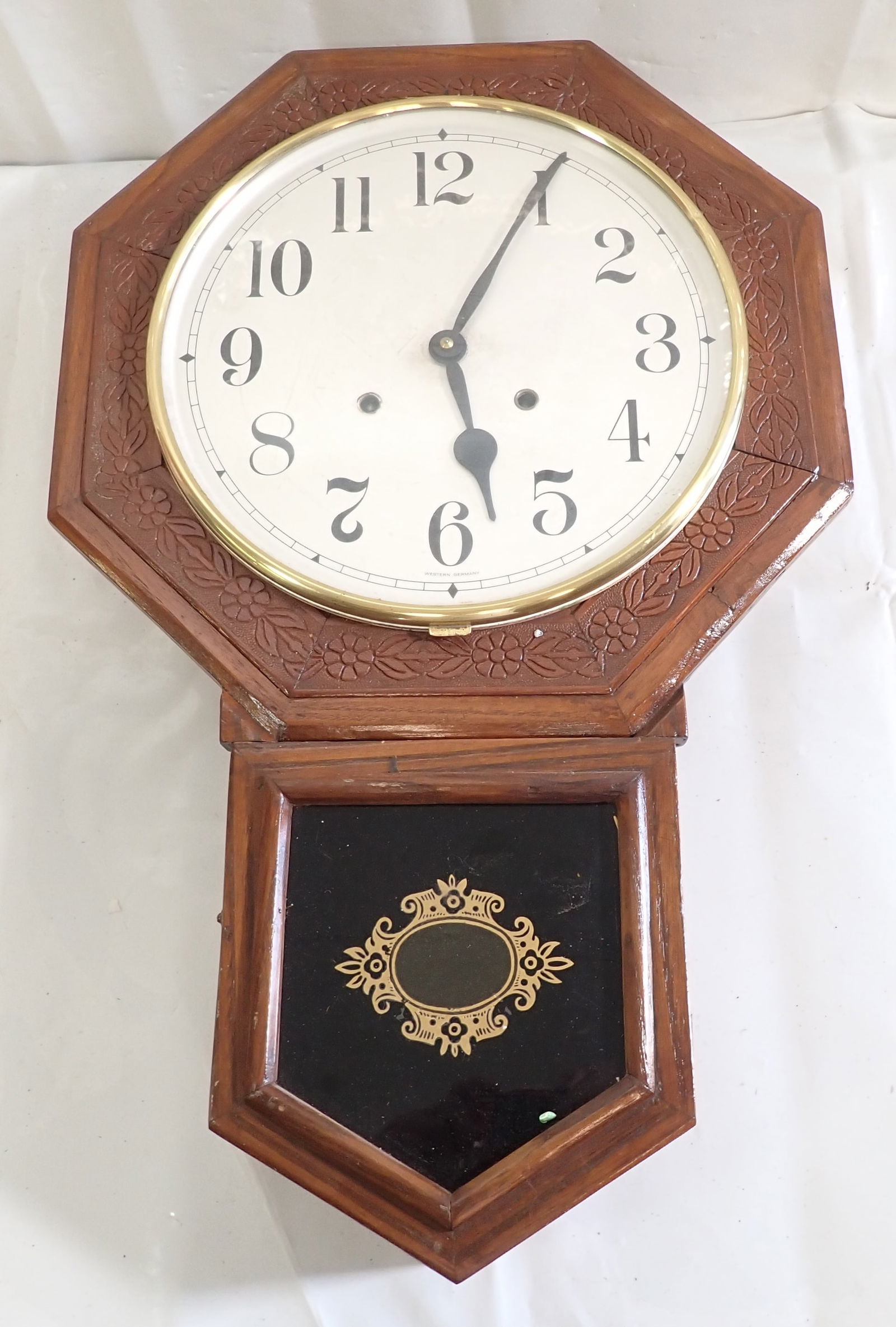 Wall Clock: Approx 16" x 25 3/4". No key. Shipping available ($35 handling charge, plus postage).