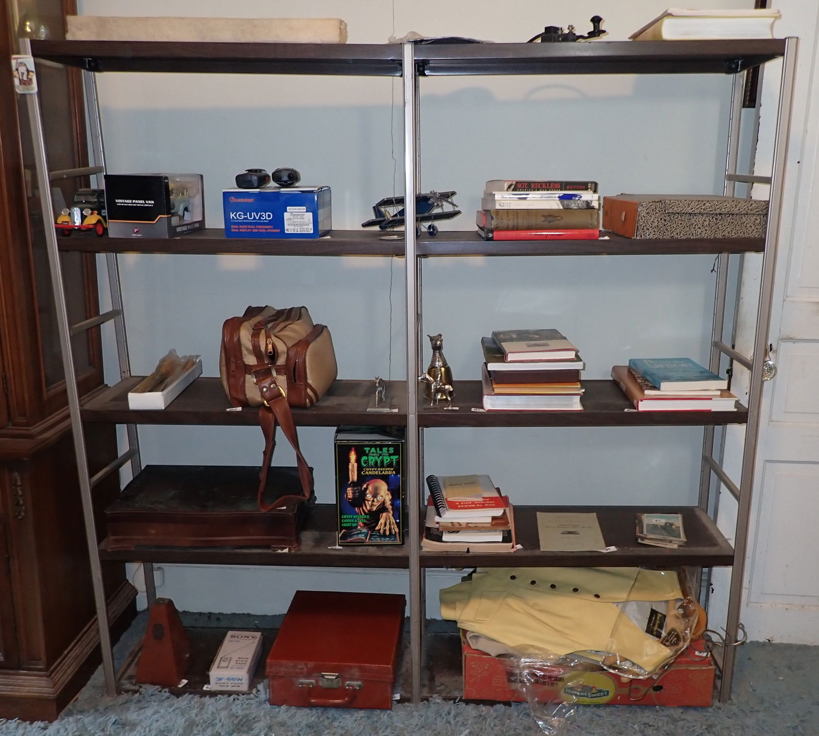 Light Duty Metal Shelf: Does not include items on it. Apprx 11 1/2" x 60" x 59 1/2" tall. No in house shipping. Bring help to remove. This is a light duty shelf. Pick up AFTER 2pm