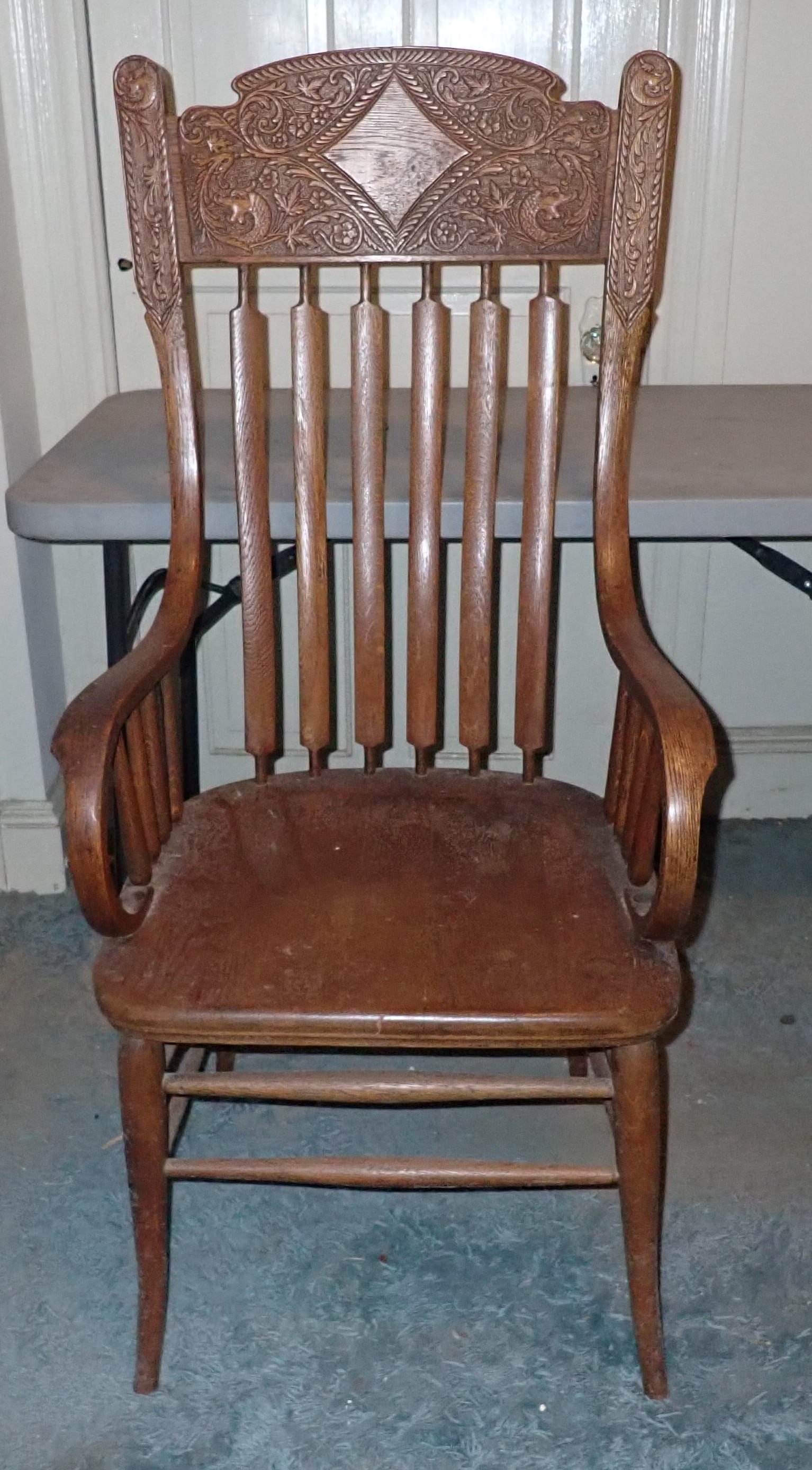 Pressed Back Arm Chair w/ Dragon Motiff: Approx 22" wide, 17 3/4" to seat, 18 1/4" deep, and 46" tall. No in house shipping !