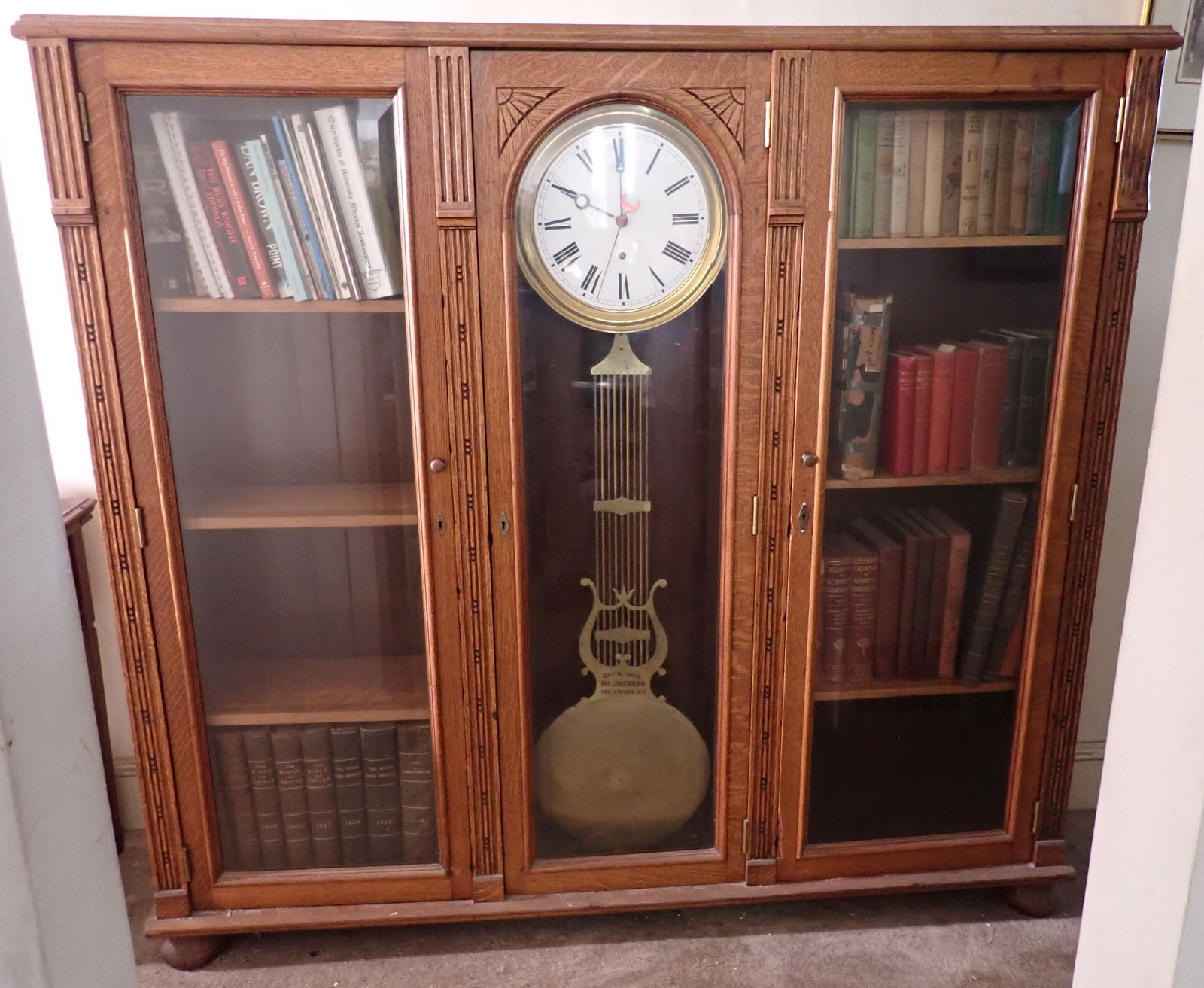 Oak Bookcase w/ M.L. Sheehan Built in Clock (1 of 7)
