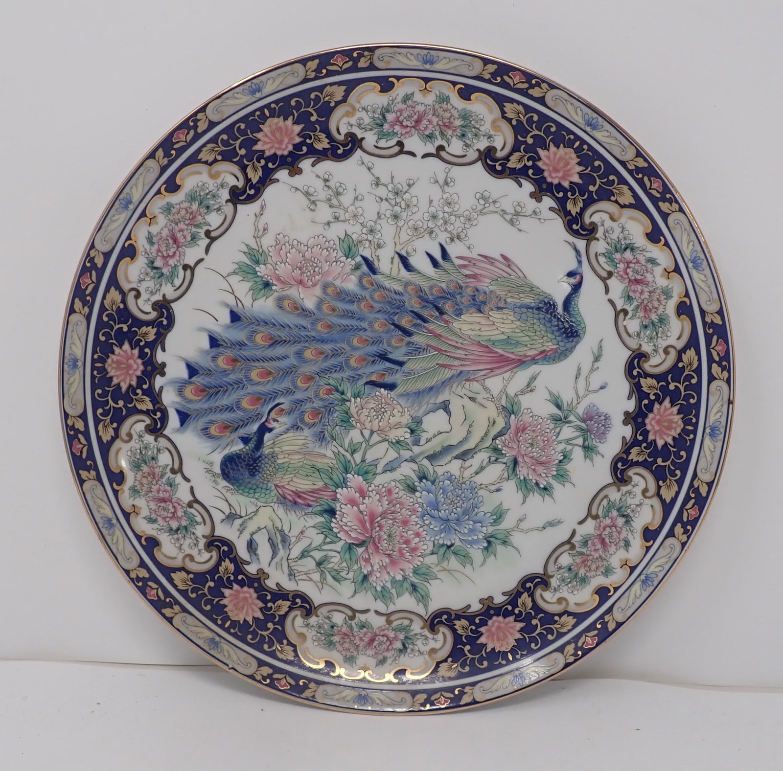 Japanese Porcelain Toyo Peacock Plate: Approx 10 1/4" in diameter. Shipping available