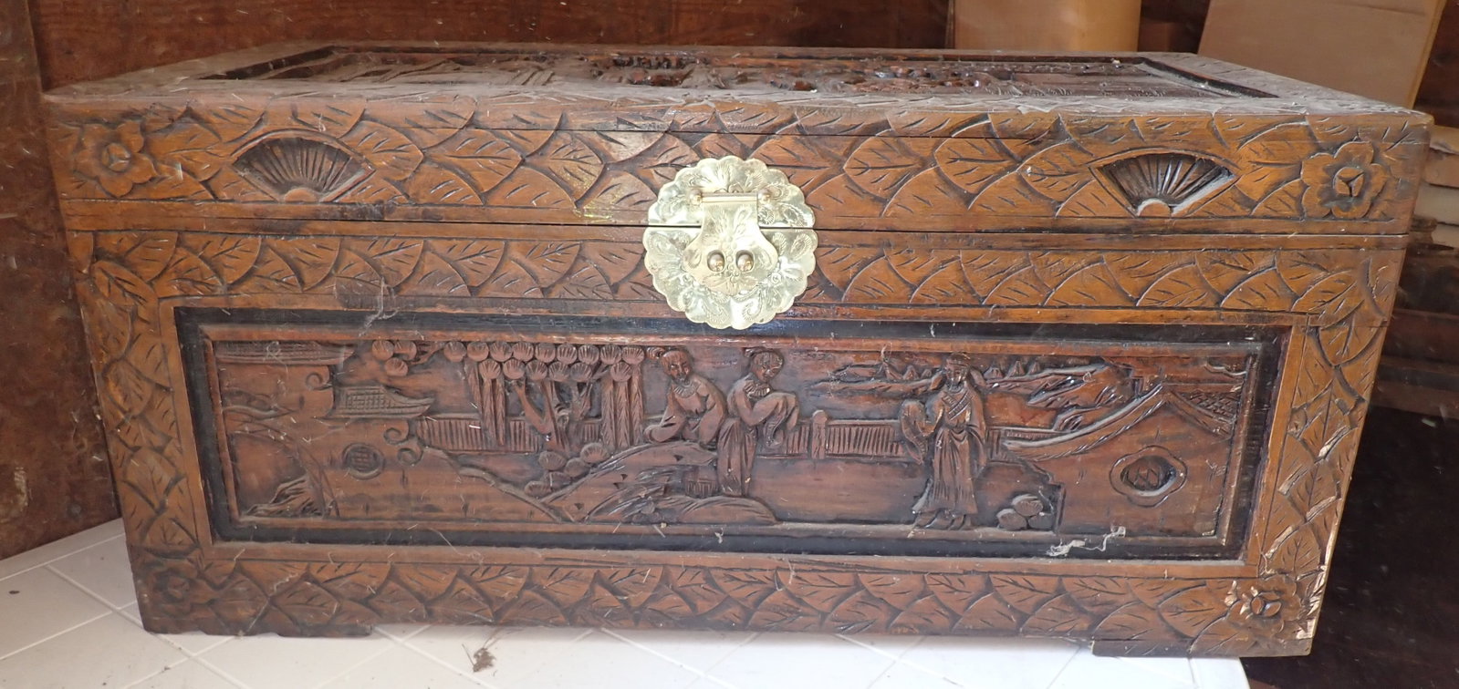 Wood Carved Chinese Chest: Approx 16 1/2" x 33 3/4" x 15 1/4" tall. Legs are inside of it. Pick up and remove AFTER 1pm. No in house shipping !