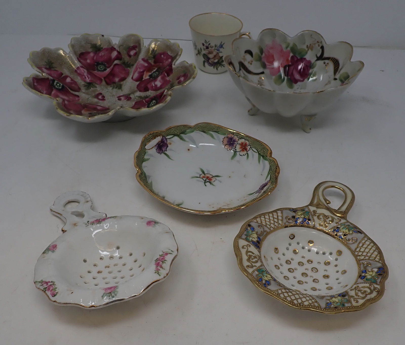 Tea Strainers , Hand Painted Nippon & Royal Copenhagen: Largest is approx 7 1/2" in diameter and 1 3/4" tall. Shipping available