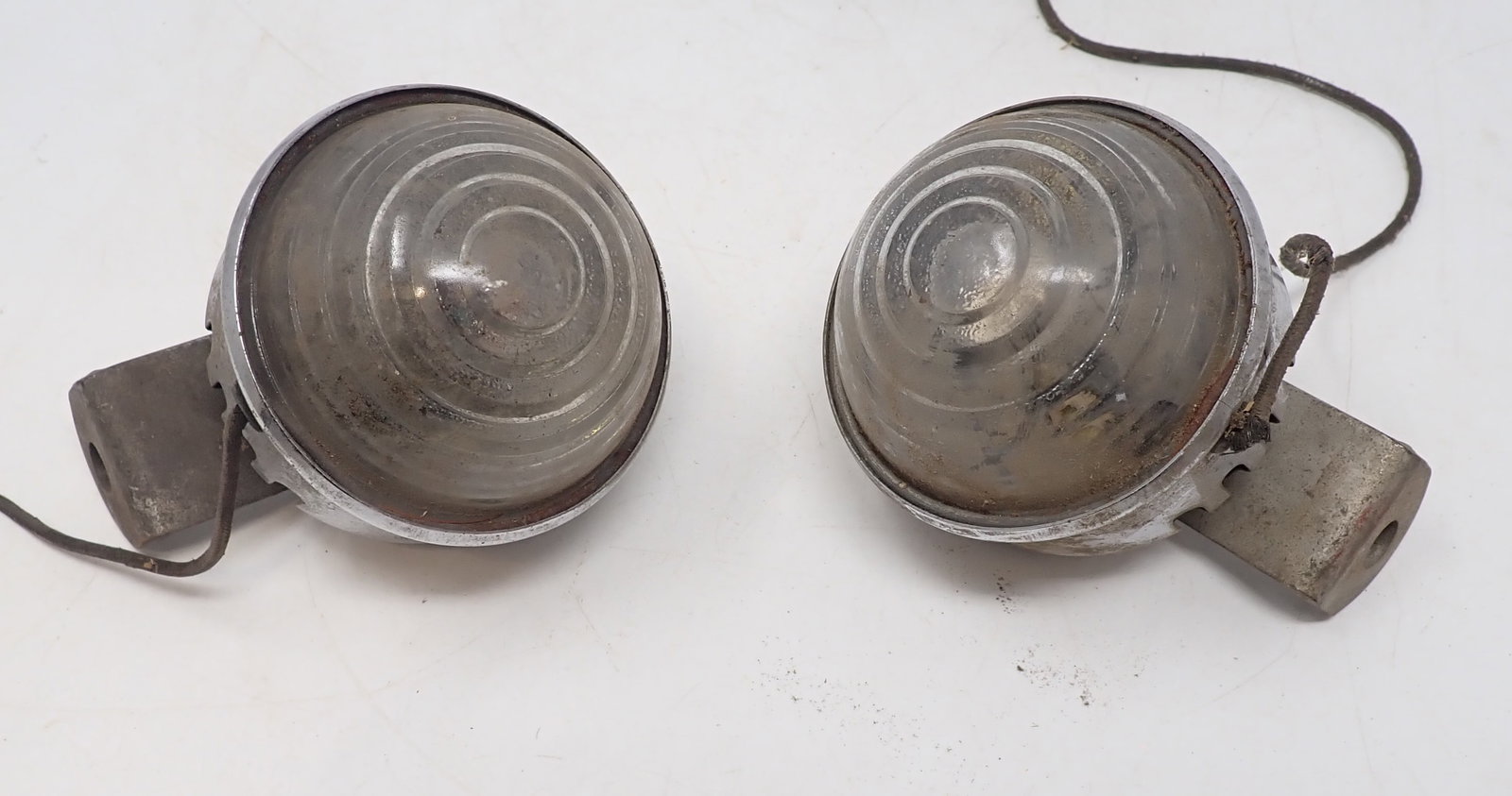Set of Chrome Lights w/ Sirens: Possibly have sirens in then. Sold as pictured, with no guarantees. Lenses are glass. Approx 3" in diameter. Shipping available