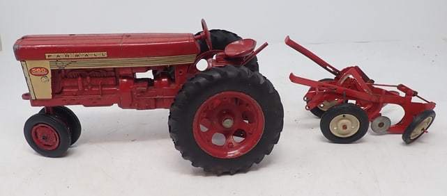 Farmall 560 Farm Tractor & McCormick Plow
