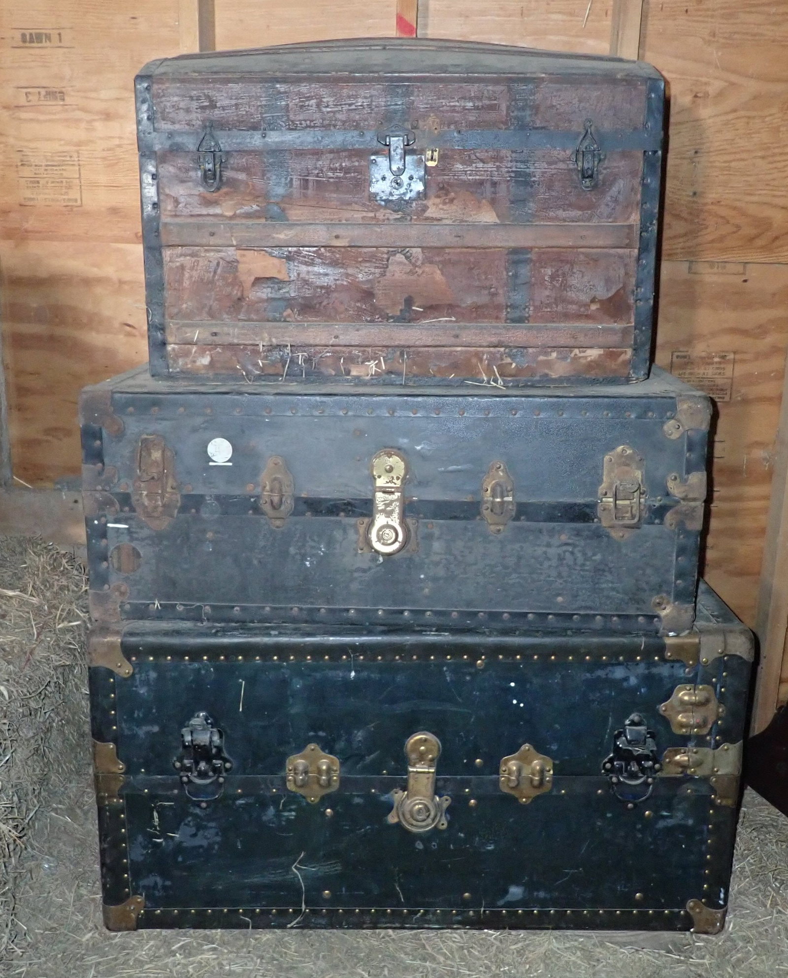 3 Trunks: Bottom one is a wardrobe and approx 22 1/2" x 40 1/2" x 21". No in house shipping ! Bring help to load !