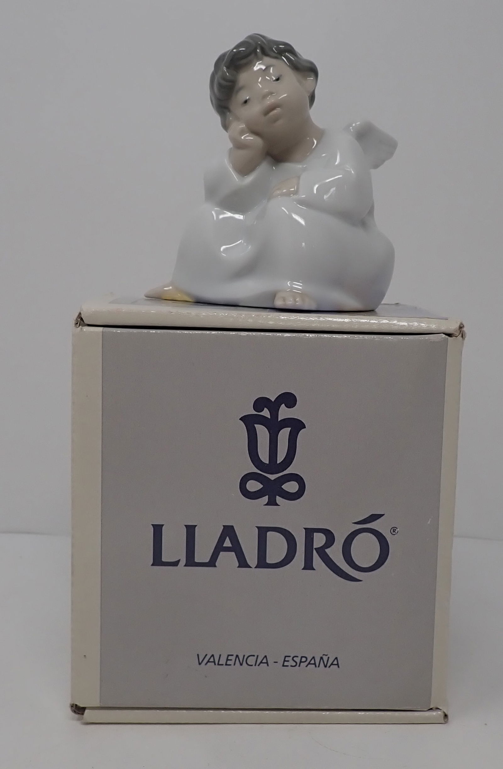 Lladro Angel Pensando: Approx 4 1/2" tall. Shipping available