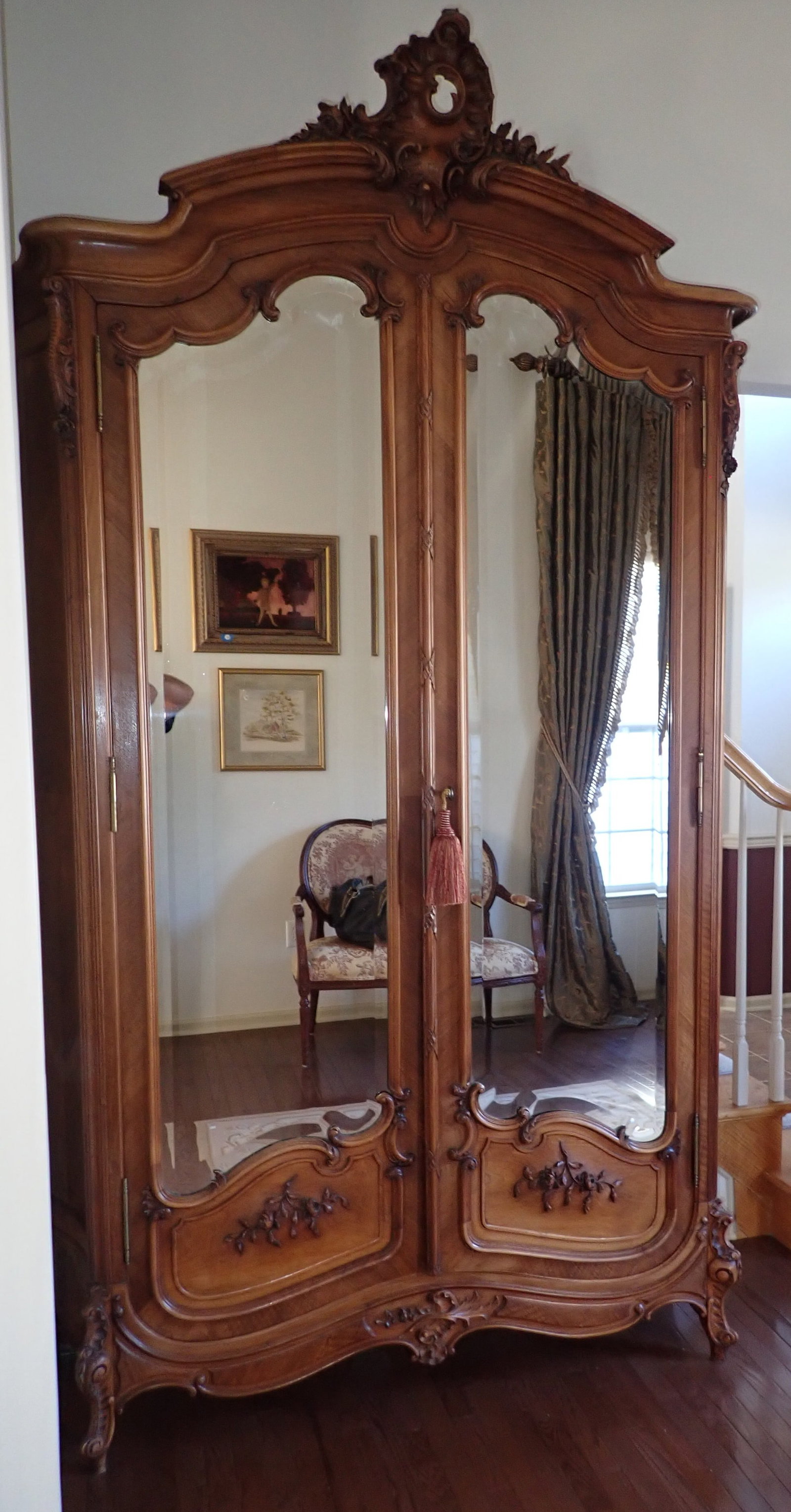 Massive French Armoire: Does not include items in it. Approx 20" x 5'6" x 9'2" tall. Mirror has beveled edges. No in house shipping ! Bring proper help to remove. Pick up after 1pm only !