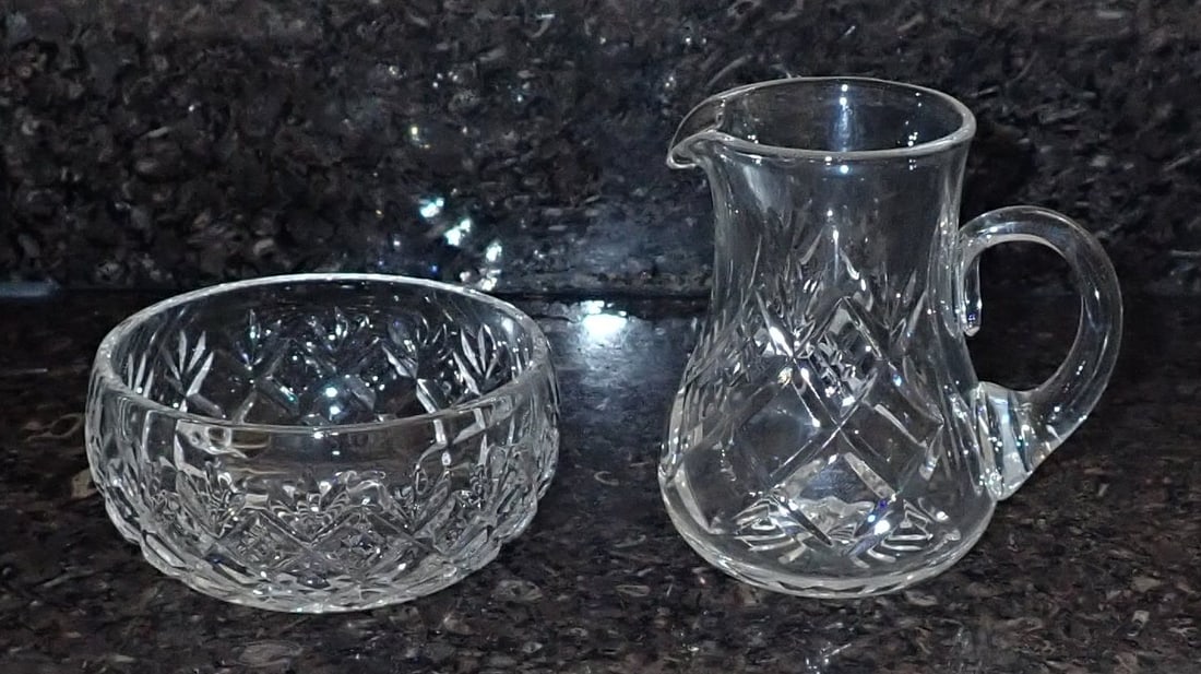 Crystal Creamer & Royal Doulton Sugar Bowl: Bowl is approx 3 1/2" in diameter and 1 3/4" tall. It is marked Royal Doulton. Creamer is not marked. Shipping available