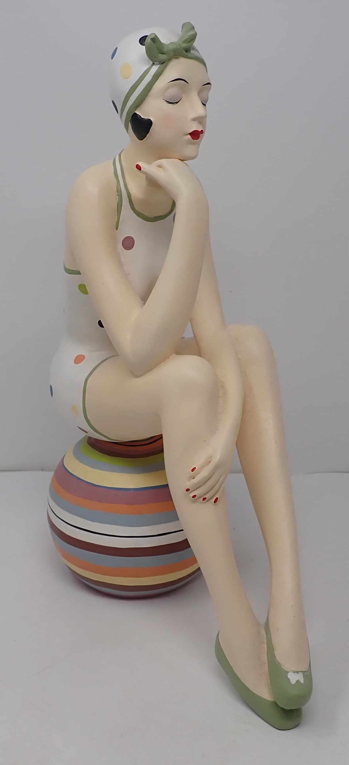 Retro Bathing Suit Figurine: Made of wood or resin ?? Approx 14" tall. Shipping available