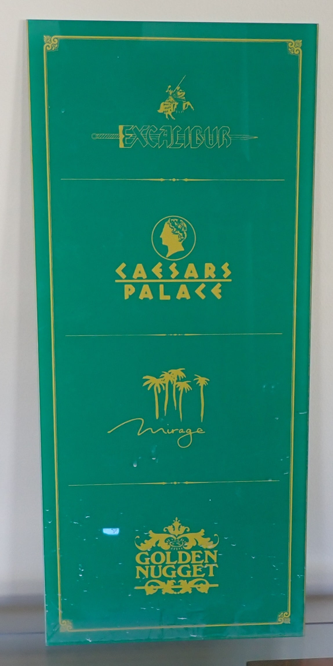 Caesars Palace Golden Nugget Sign: Plexiglass sign is approx 9 1/2" x 21 1/2". Shipping available