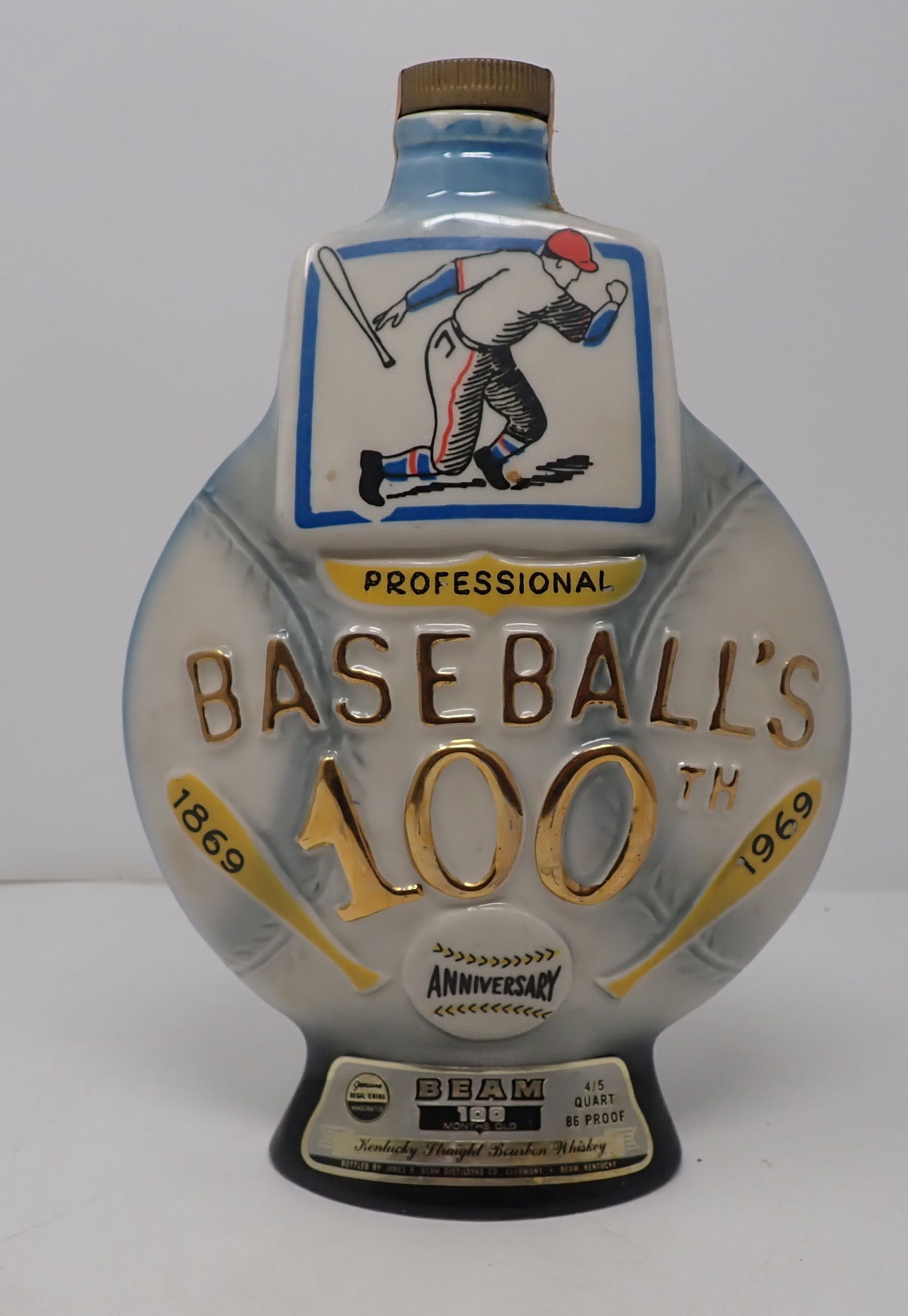 Beam Baseball's 100th Decanter: Approx 10 3/8" tall. Still sealed ! Must be dumped out before removing from house. No shipping !