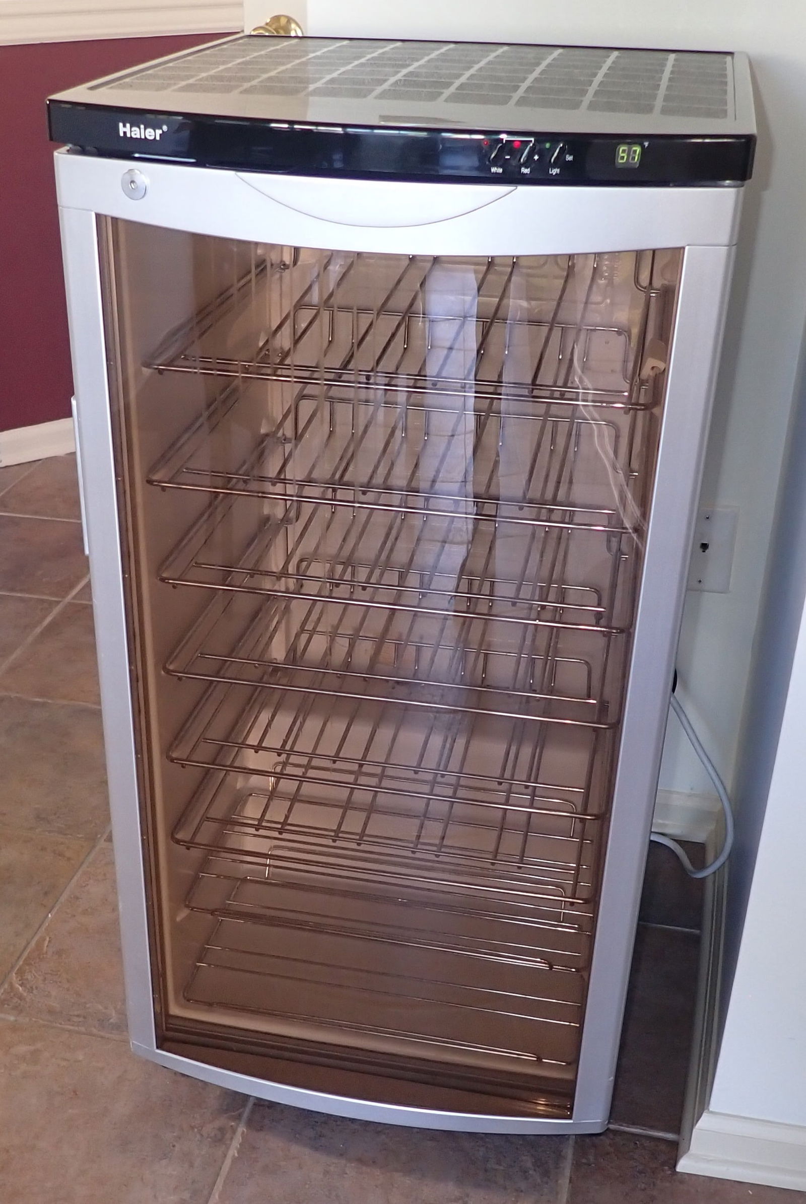 Haier Freestanding Wine Cooler: Approx 19 7/8" x 21 1/8" x 38 5/8" tall. No in house shipping ! Bring help to remove. No sliding across floor !