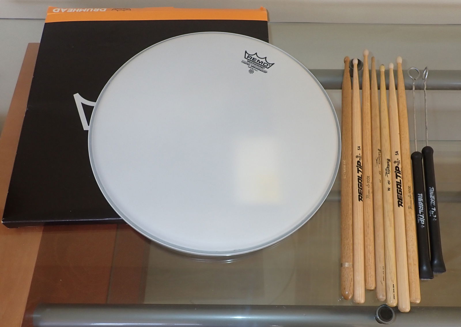 Remo Ambassador 14" Drumhead & Drumsticks: Shipping available