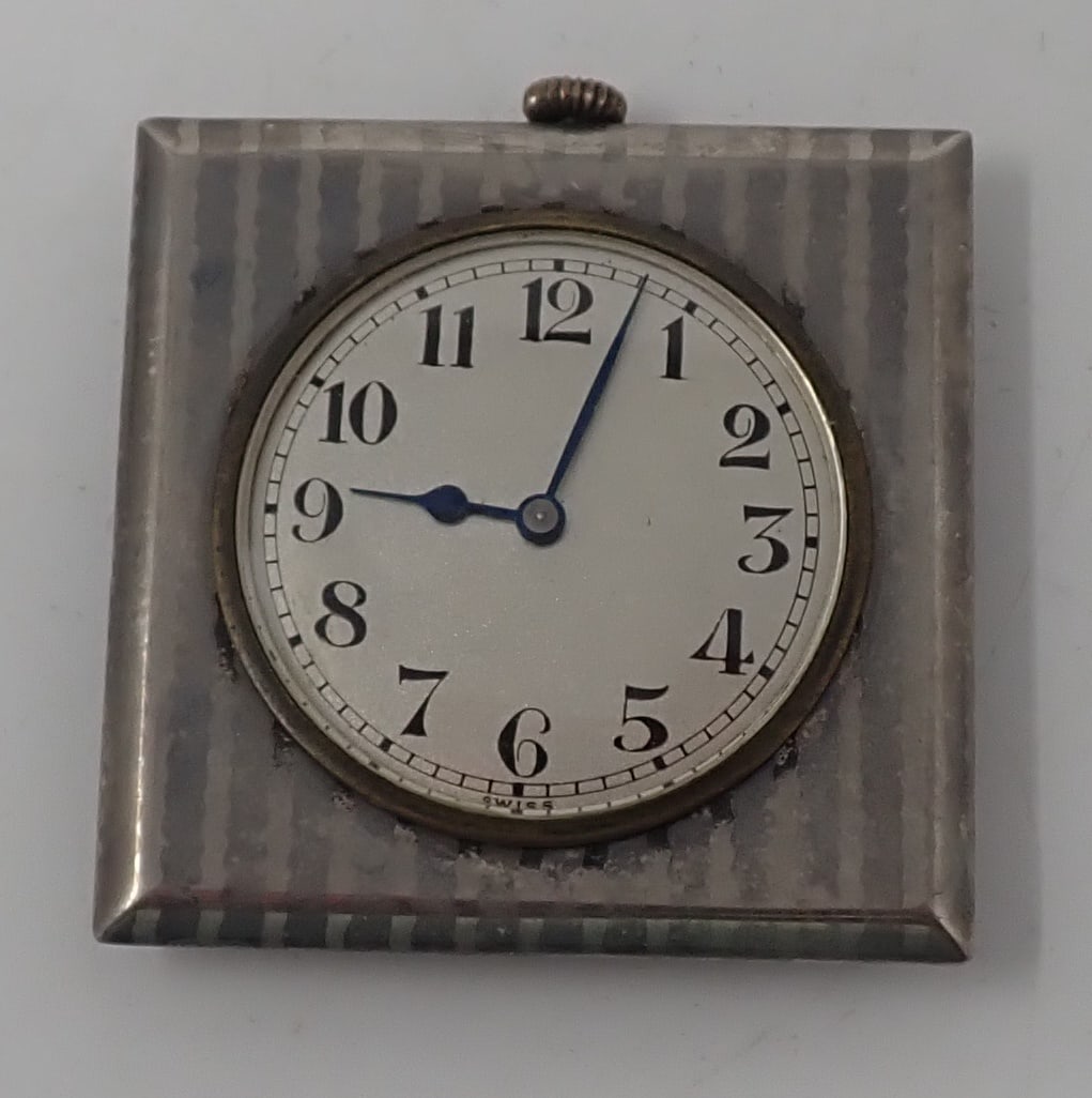 Swiss Clock: Approx 1 3/4" x 1 3/4". Shipping available