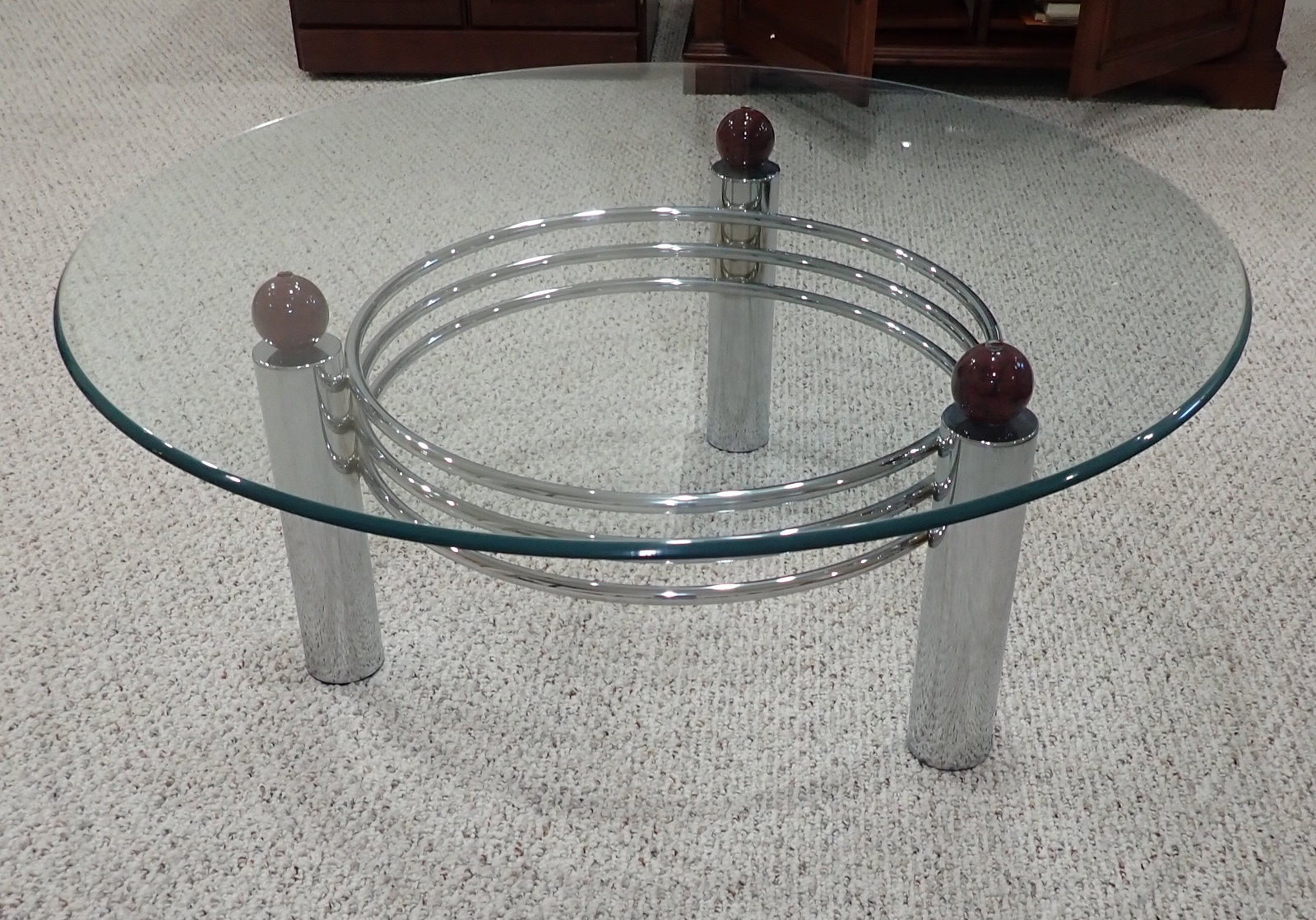 Chrome Glass Top Coffee Table: Approx 39 3/4" in diameter and 16 1/2" tall. No in house shipping ! Bring proper help to remove.