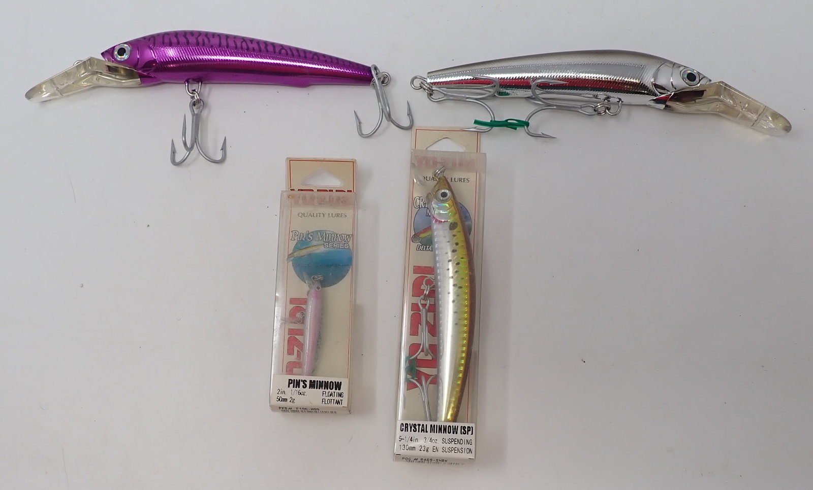 Yo-Zuri Fishing Lures: Largest are approx 7". Front left one is not marked Yo-Zuri. Shipping available