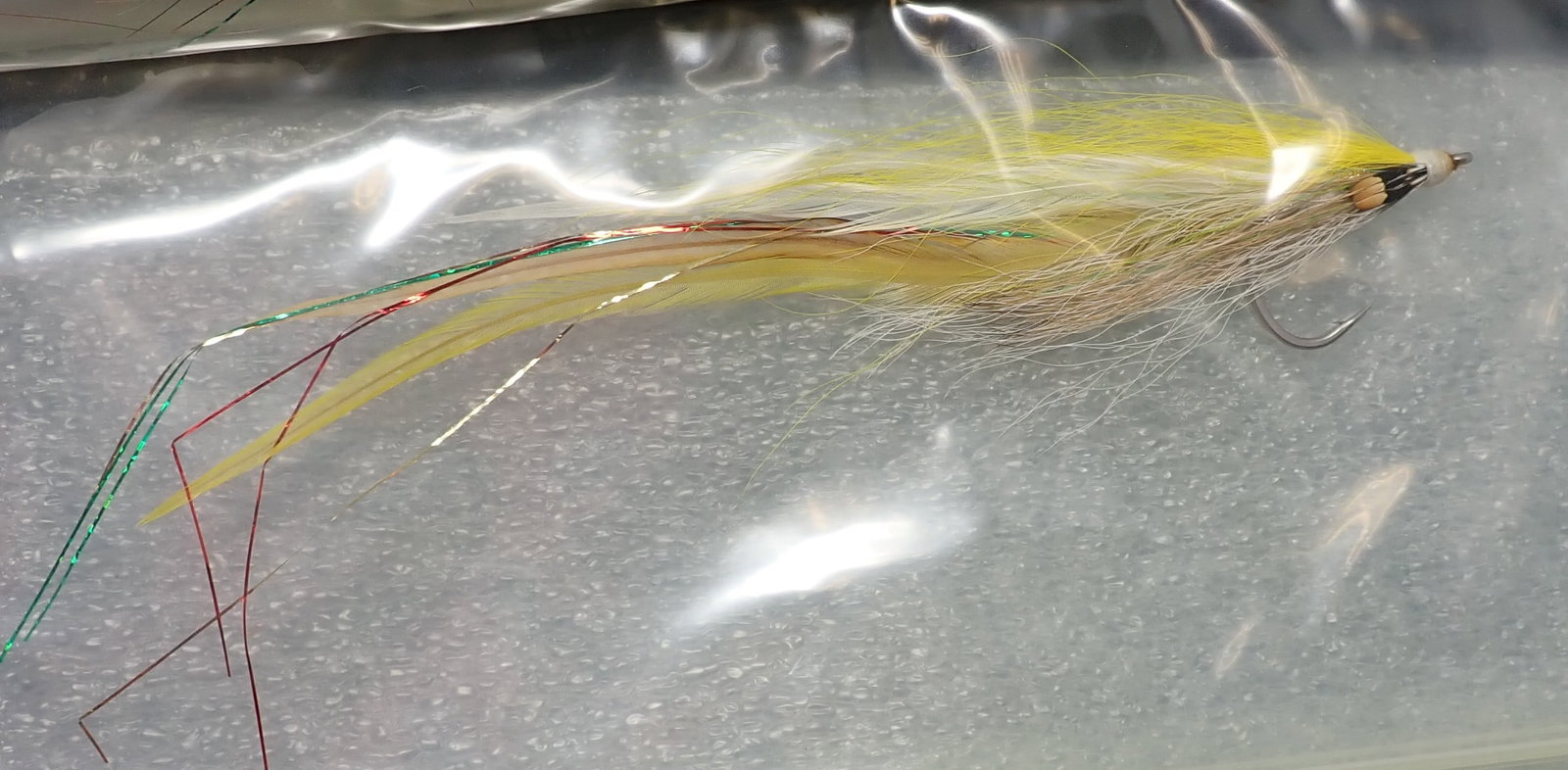 21 Fly Fishing Fies & Finsport Case: Largest are approx 5 1/2". Shipping available