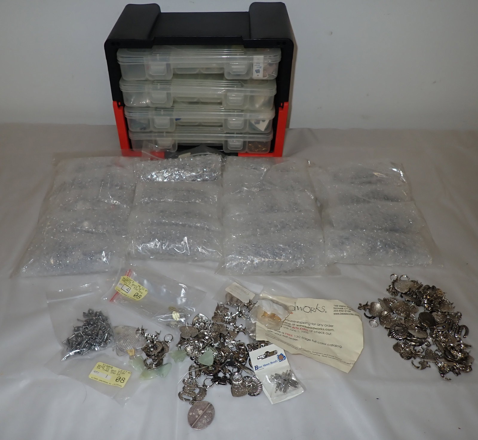 Charms , Jewelry , & Craft Pieces: There are 18 bubble wrapped packages of the items in the last photo. Not 18 bags, 18 packages inside the bags. Shipping available