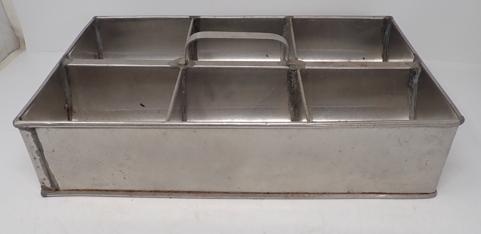 Stainless Steel Divided Tote: Approx 9 5/8" x 15 3/8" x 3 1/2" tall (Not including height of handle). Shipping available