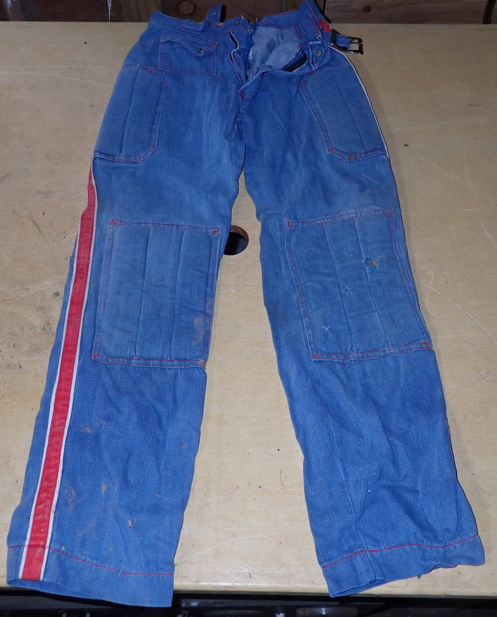 Vintage Motorcycle Racing Pants: Waist measures approx 12" across and length is apprx 36 1/2". Shipping available