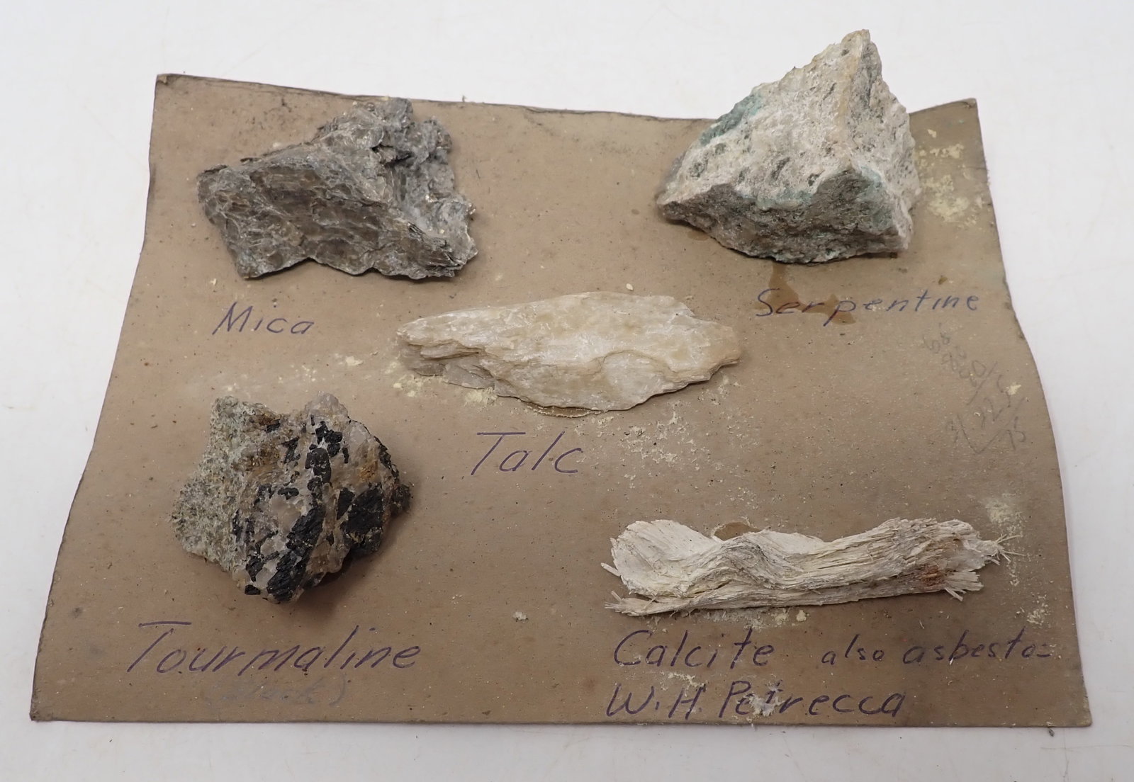 Mica , Talc, Tourmaline, & Misc: Largest is approx 1 3/4" x 2 1/2". Shipping available. We do not guarantee the names are correct. Identification was done thru the rock app. Sold as pictured.
