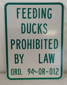 Feeding Ducks Prohibited By Law Sign