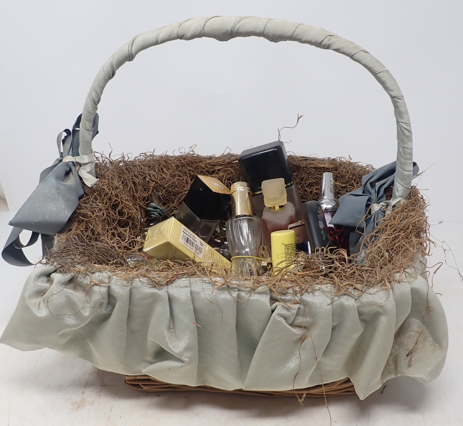 Basket of Misc Perfumes: The Chanel that is in back on left is almost empty. No in house shipping !