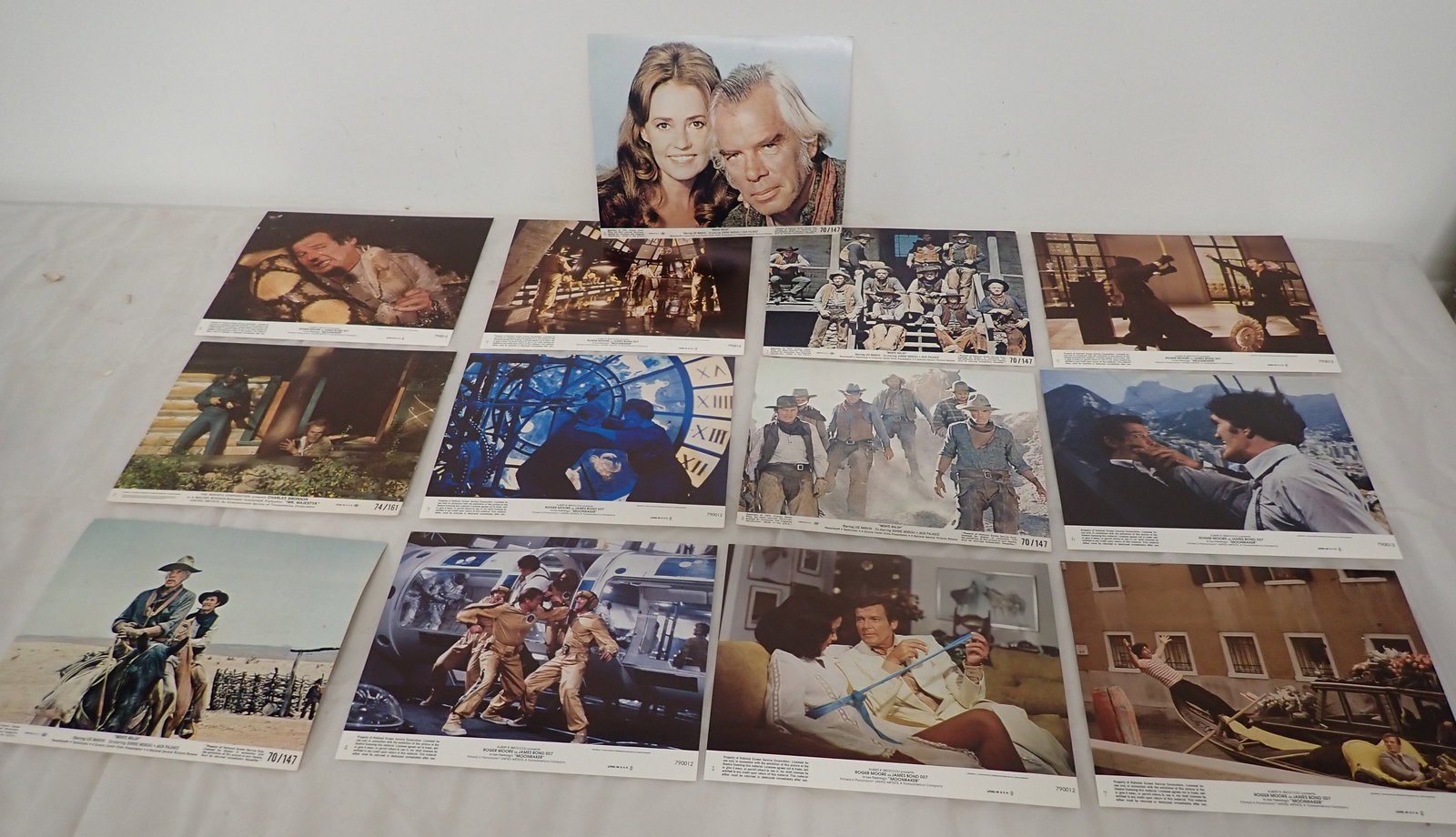 1970's Lobby Cards incl Moonraker , Monte Walsh , Mr Majestyk (1 of 6)