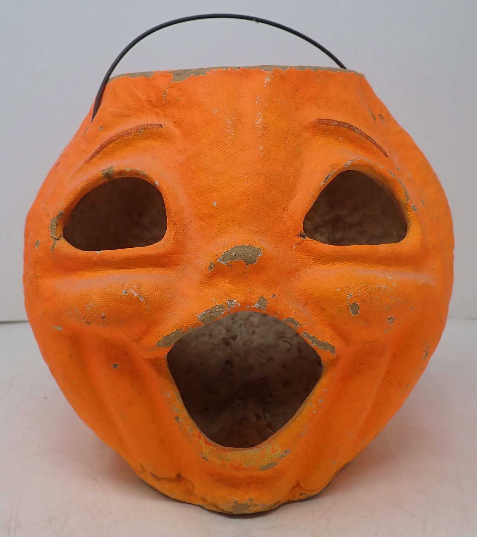 Paper Mache Pumpkin / Jack-o'-Lantern: Approx 6" x 8" x 7 1/4" tall. Shipping available