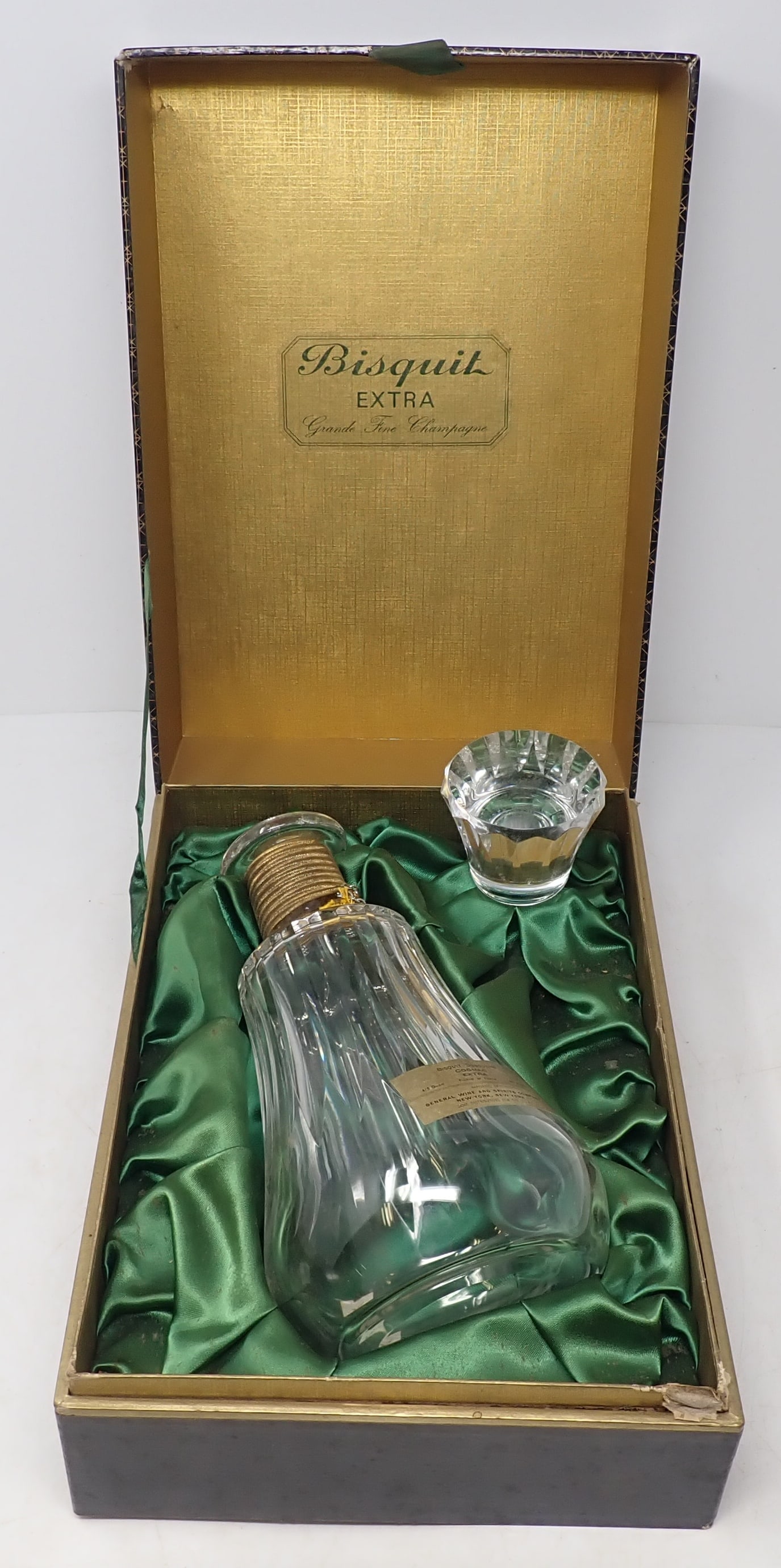 Baccarat Cognac Bisquit Decanter: Apprx 4 1/2" in diameter and 10 1/4" tall. Shipping available