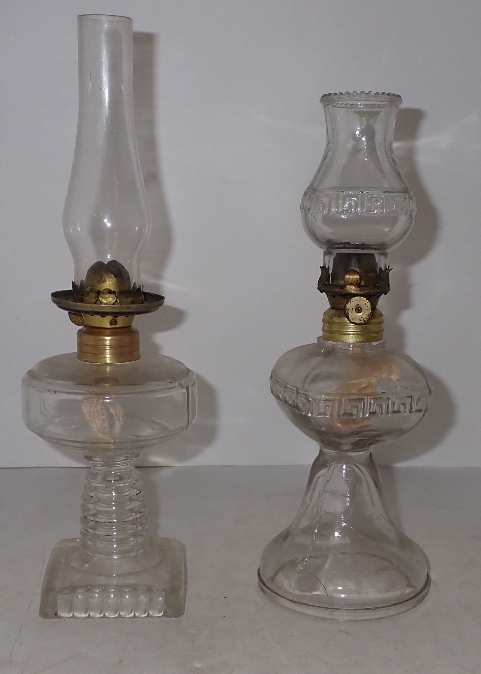 2 Miniature Oil Lamps: Tallest is approx 9 3/4" tall. Shipping available