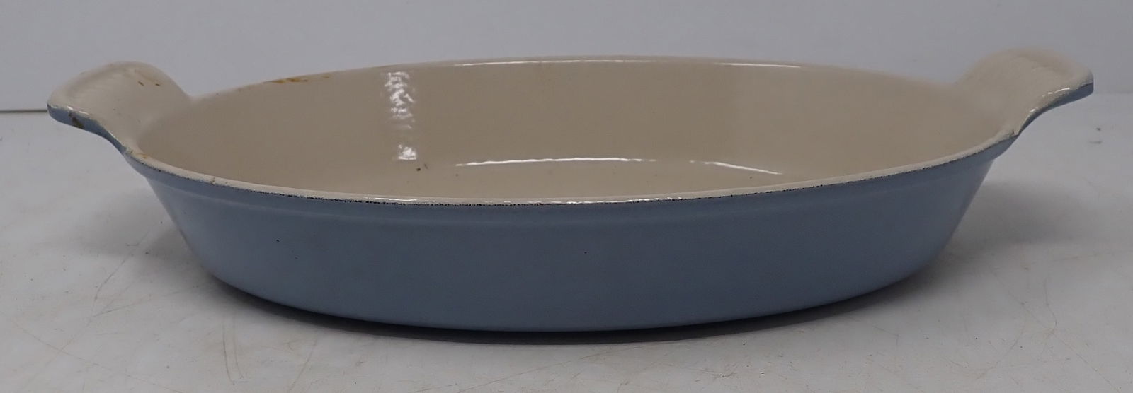 Le Creuset Enameled 24 Casserole: Apprx 7 1/8" x 11 1/4" x 2" tall. Shipping available