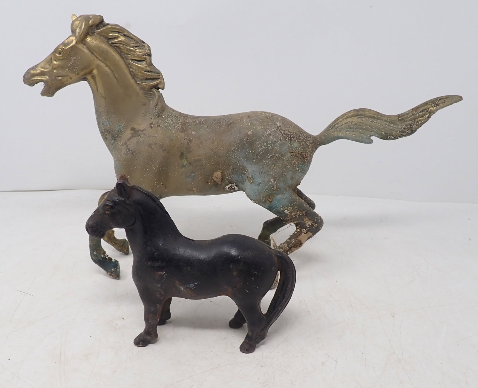 Cast Iron Bank and Brass Finish Horses: Largest is apprx 12" long and 7 3/4" tall and has Taiwan sticker on bottom. Shipping available