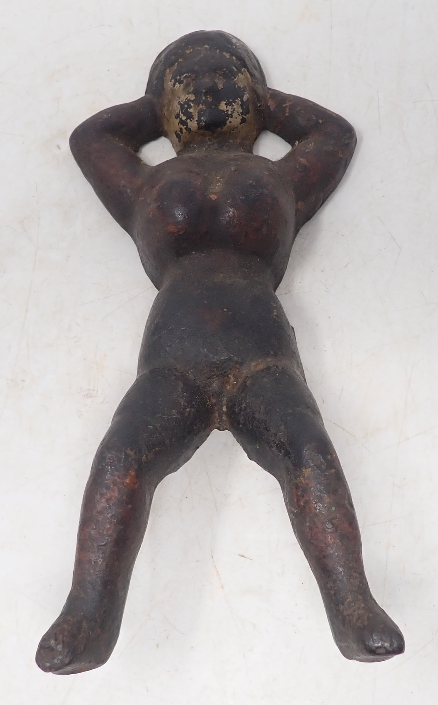 Naughty Nelly Cast Iron Book Jack: Approx 4" x 9 1/2". Shipping available