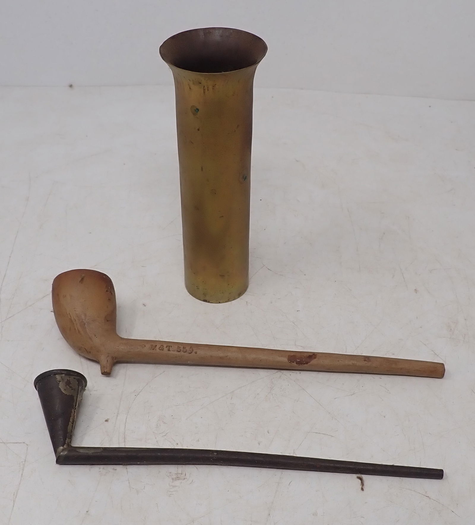 Brass Vase , Tin. & Clay Pipes: Vase is apprx 1 5/8" in diameter and 5" tall. Shipping available
