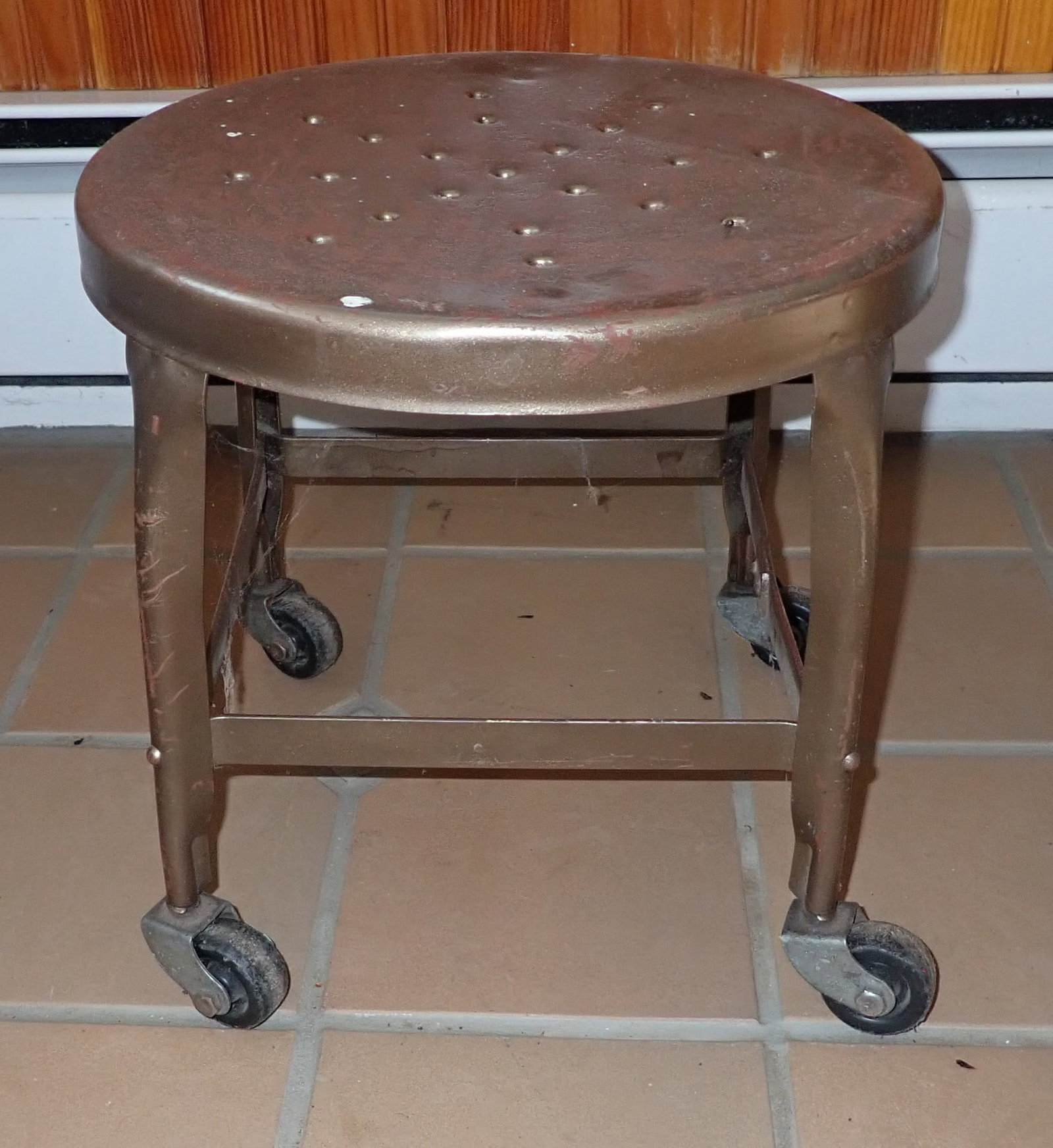 Industrial Rolling Stool: Approx 14 1/2" in diameter and 14" tall. Shipping available ($20 handling charge, plus postage)