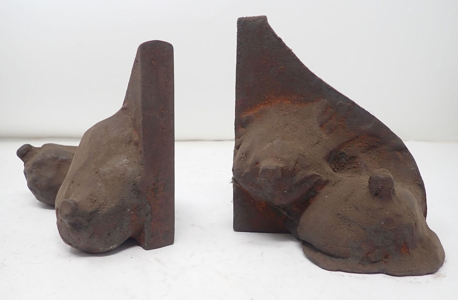 Steel Sculpture Adult Bookends: Largest is apprx 2 5/8" x 6 3/8" x 5" tall . Shipping available