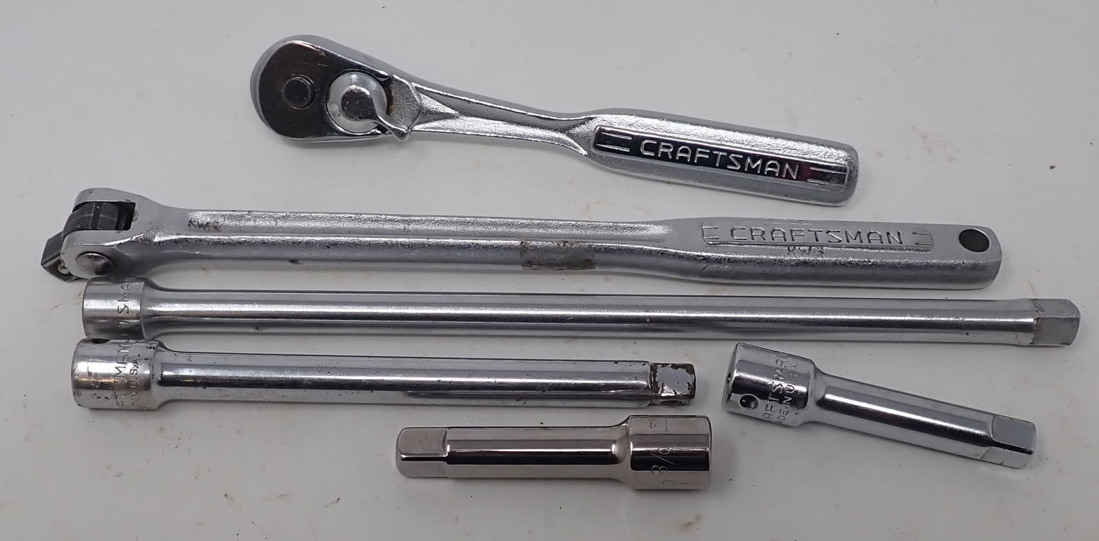 Craftsman 3/8" Rachet, Breaker Bar, & Extensions: Rachet is approx 6 3/4" long. Shipping available