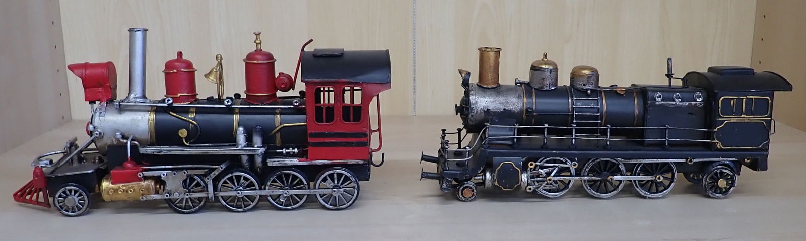 Tin Decorator Trains: Red one is approx 13" long. Shipping available. Items are located on the second floor. These are not located in the section of the building we normally have sales. There is a loading dock you can