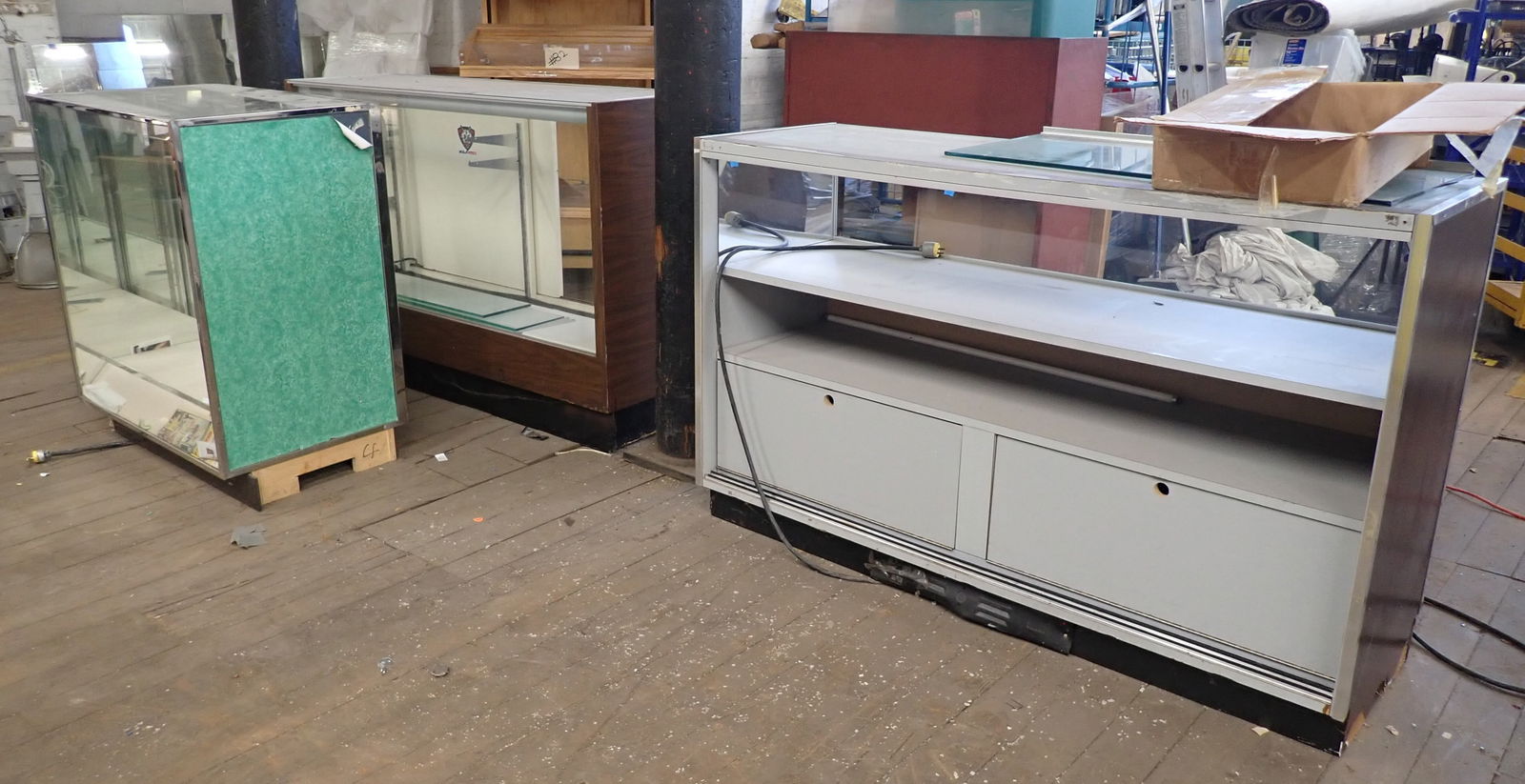 7 Glass Showcases: Bring help to remove. NO in house shipping ! Items are located on the second floor. These are not located in the section of the building we normally have sales. There is a loading dock you can back in