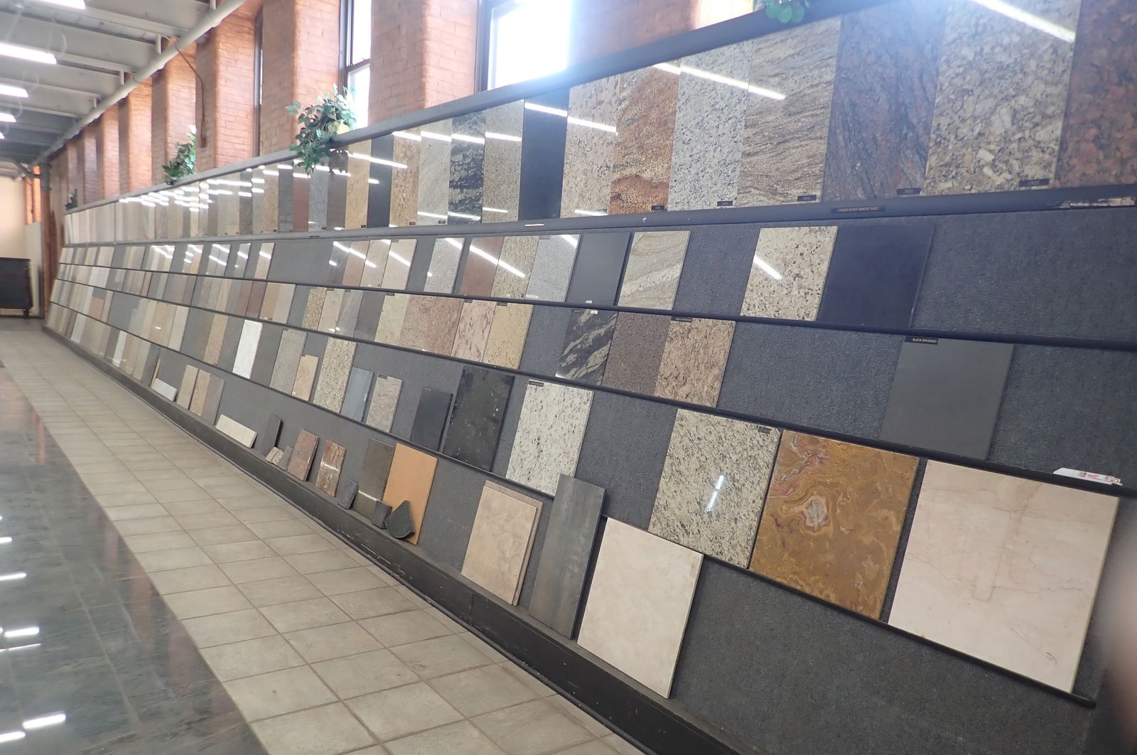 Showroom Display of Tiles: NO in house shipping ! Items are located on the second floor. These are not located in the section of the building we normally have sales. There is a loading dock you can back into and walk down