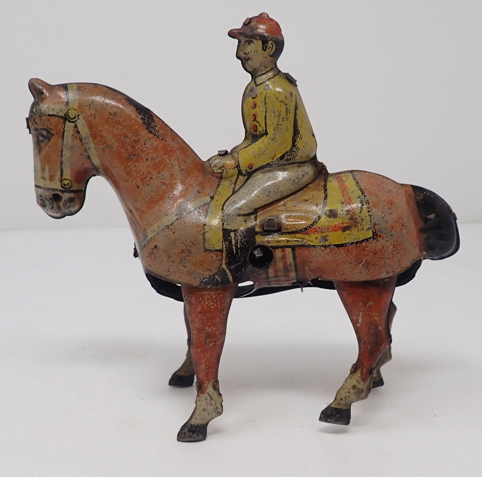 D.R.G.M German Tin Litho Wind Up Horse & Jockey: Horse & Jockey - Approx 5" long and 5" tall. Shipping available