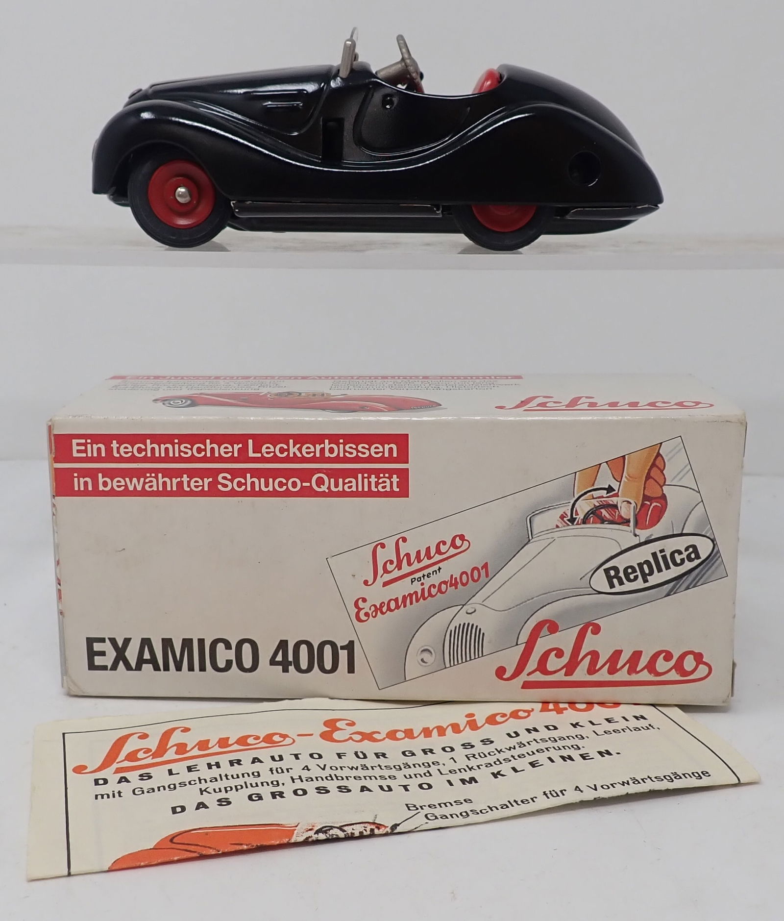Schuco Replica Examico 4001 Wind Up Car: Does not come with a key. Approx 5 1/2" long. Shipping available