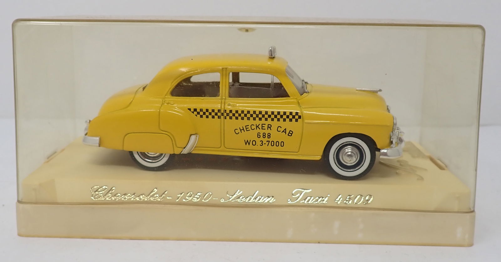 Solido Chevrolet 1950 Sedan Taxi 4509: Checkered Cab - Approx 4 1/4" long. Shipping available
