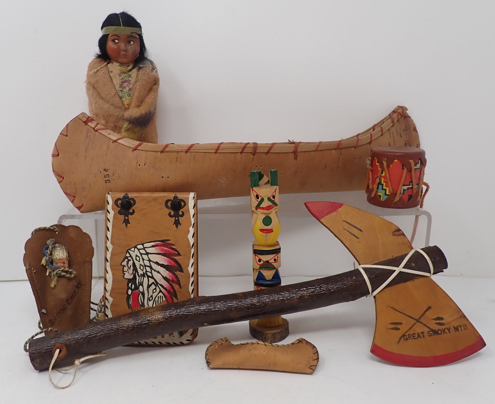 Indian Canoe, Ax, Doll, Totem Pole, Drum: Large Canoe is apprx 13 1/2" long. Shipping available
