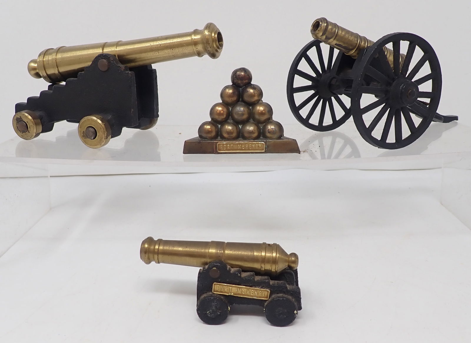 Brass Cannons: Largest is approx 5 1/4" long and 2 7/8" tall. Balls are not brass. Shipping available